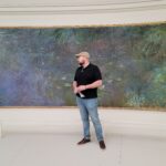 Eric Firestone in fromt of Water Lilies by Monet, Musee de l'Orangerie, Paris